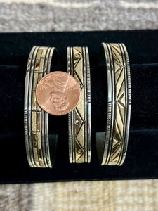 Alvin Monte gold cuff bracelets