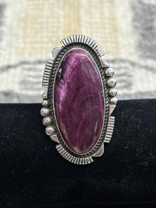 Purple spiny and dinosaur bone rings