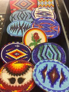 Beaded belt buckles