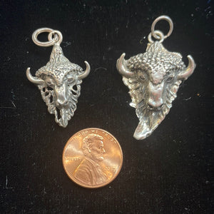 Cast buffalo pendants