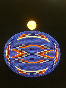 Beaded belt buckles