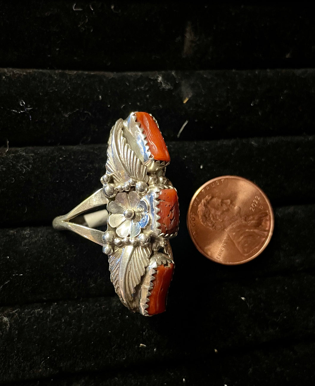 Three stone coral rings