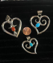 Load image into Gallery viewer, Sandcast heart pendants
