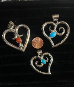 Sandcast heart pendants