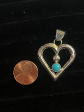 Load image into Gallery viewer, Sandcast heart pendants
