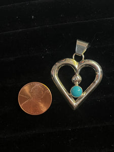 Sandcast heart pendants