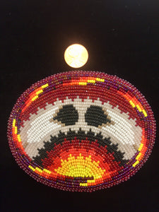 Beaded belt buckles