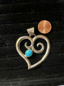 Sandcast heart pendants