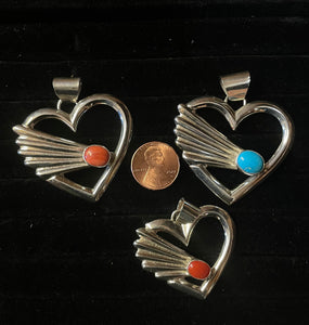 Sandcast heart pendants