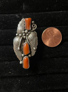 Three stone coral rings